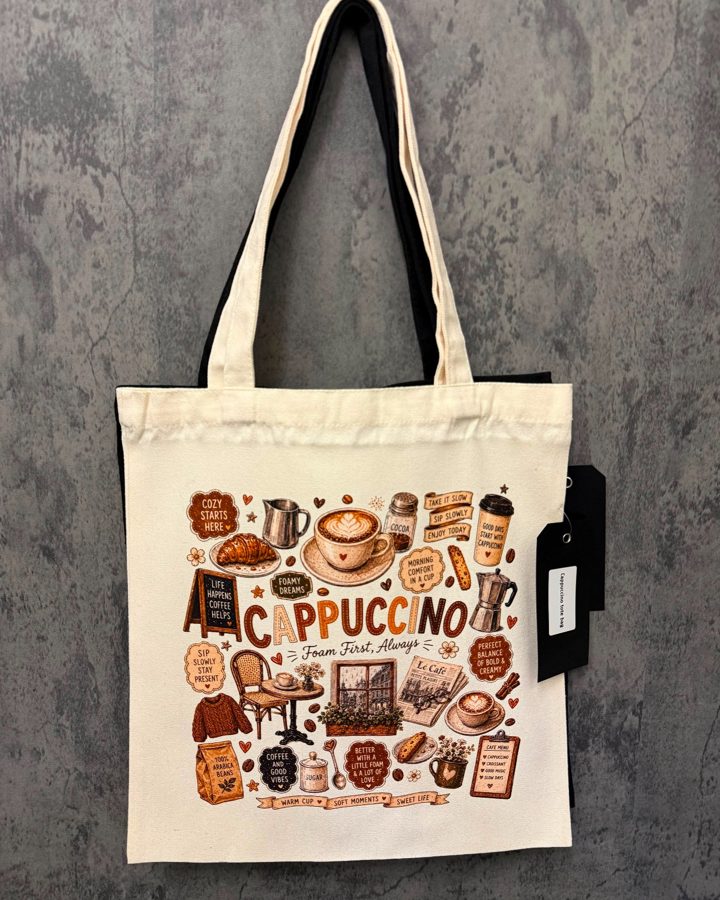 A natural canvas tote with a cappuccino and cafe illustration