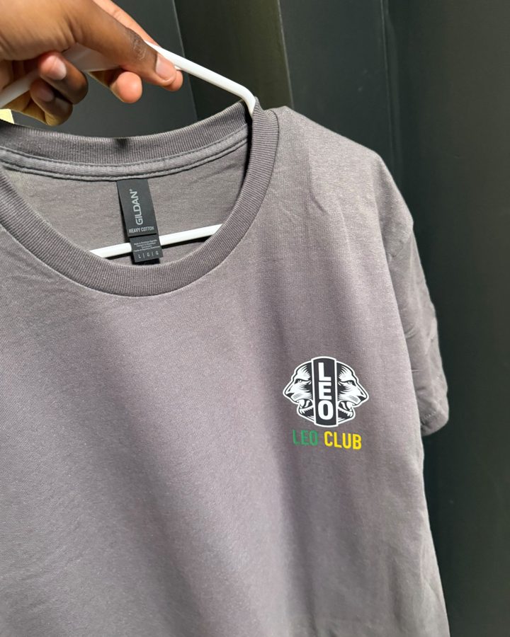 A gray t-shirt with a small club logo on the chest
