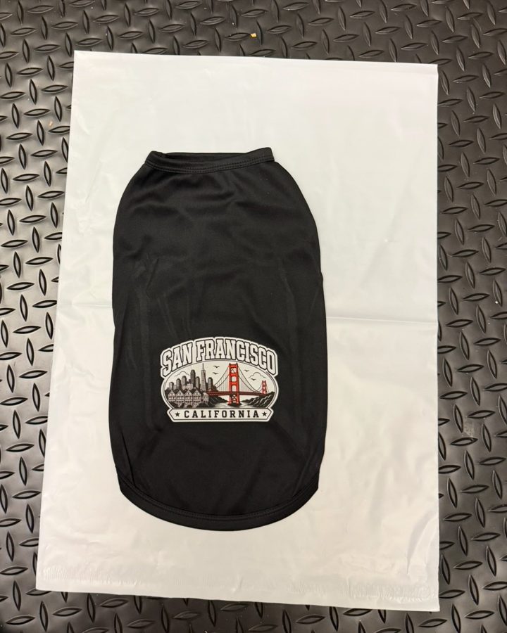 A small black shirt with a San Francisco and Golden Gate Bridge print